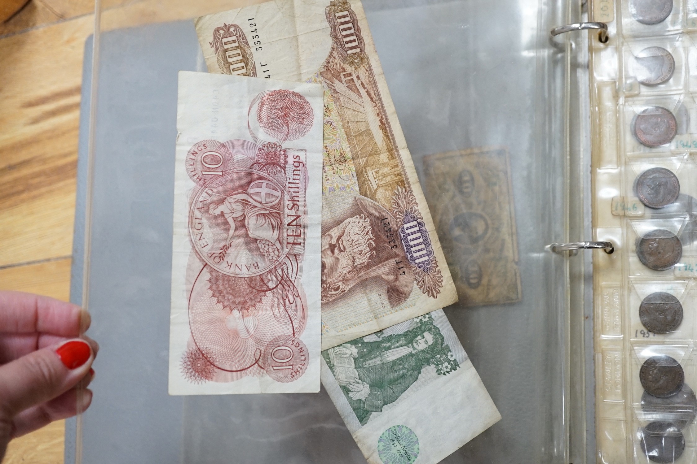 UK and World coins in a case and three albums